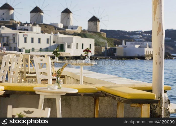 Chairs and tables in a restaurant, Mykonos, Cyclades Islands, Greece