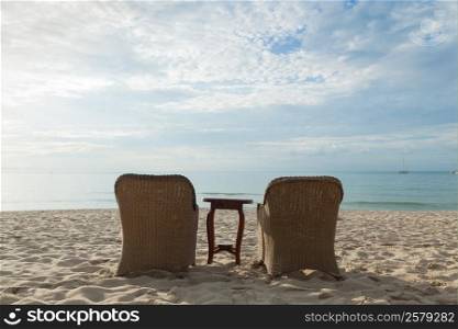 Chairs and tables on the beach Near the sea Relaxing on the beach