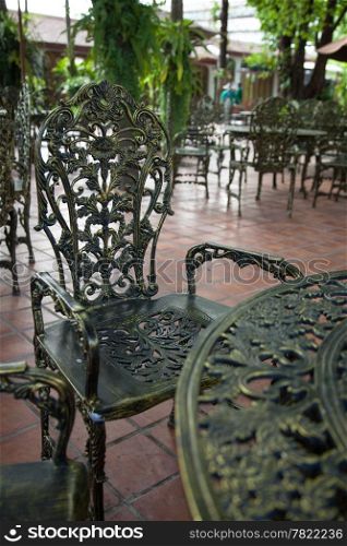 Chairs and tables. Seating area in the garden. Arrange for the sale of food.
