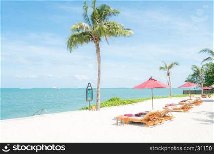 Chairs and umbrella on a beautiful tropical beach Thailand