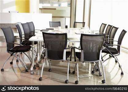 Chairs Arranged Around Empty Boardroom Table