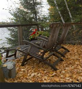 Chairs at deck, Lake of The Woods, Ontario, Canada