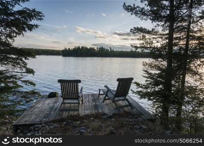 Chairs on a deck, Lake of the Woods, Ontario, Canada