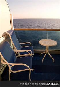 Chairs on balcony of cruise ship