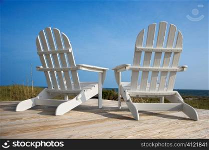 Chairs on Deck Facing Ocean
