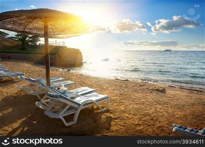 Chaise-longues on a beach of the Red sea