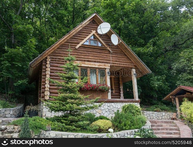 Chalet from logs in the forest