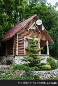 Chalet from logs in the forest