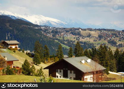 chalet in alpine mountains