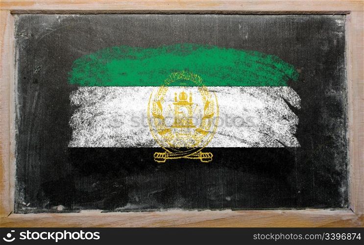 Chalky afghanistan flag painted with color chalk on old blackboard