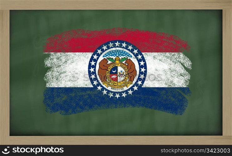 Chalky american state of missouri flag painted with color chalk on old blackboard