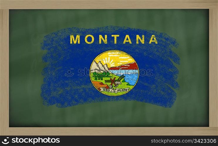 Chalky american state of montana flag painted with color chalk on old blackboard