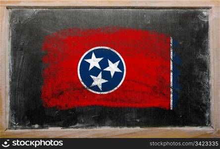 Chalky american state of tennessee flag painted with color chalk on old blackboard