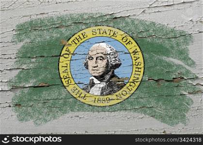 Chalky american state of washington flag painted with color chalk on grunge wooden texture