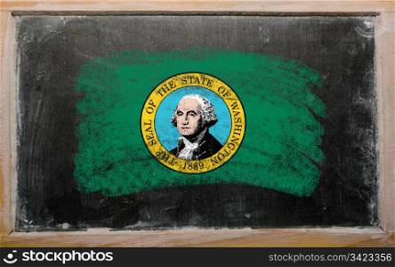 Chalky american state of washington flag painted with color chalk on old blackboard