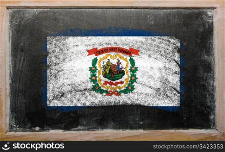 Chalky american state of west virginia flag painted with color chalk on old blackboard