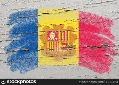 Chalky andoran flag painted with color chalk on grunge wooden texture