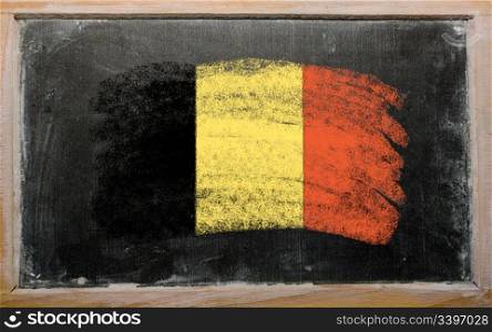 Chalky belgian flag painted with color chalk on old blackboard
