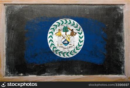 Chalky belize flag painted with color chalk on old blackboard
