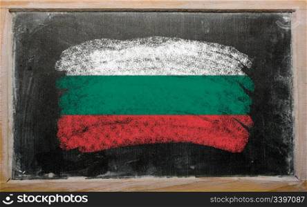 Chalky bulgarian flag painted with color chalk on old blackboard