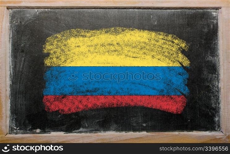 Chalky columbian flag painted with color chalk on old blackboard