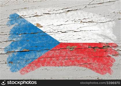 Chalky czech flag painted with color chalk on grunge wooden texture