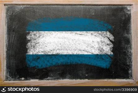 Chalky el salvador flag painted with color chalk on old blackboard