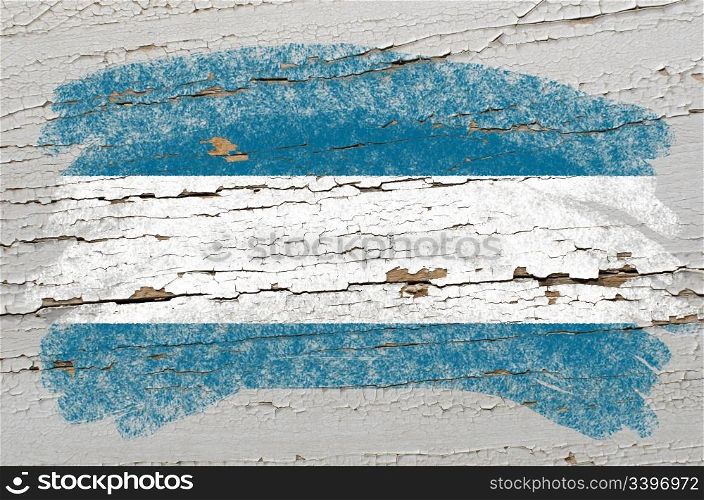 Chalky elsalvador flag painted with color chalk on grunge wooden texture