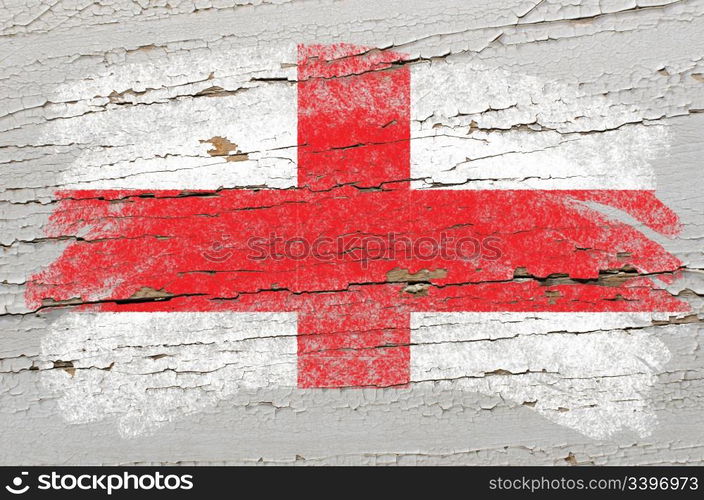 Chalky english flag painted with color chalk on grunge wooden texture