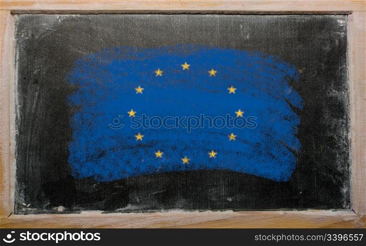 Chalky european union flag painted with color chalk on old blackboard