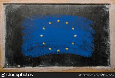 Chalky european union flag painted with color chalk on old blackboard