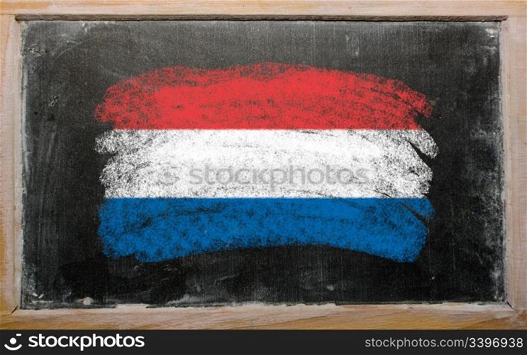 Chalky holland flag painted with color chalk on old blackboard