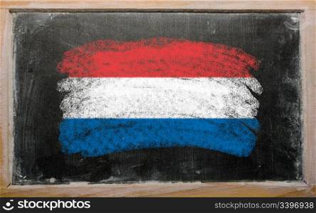 Chalky holland flag painted with color chalk on old blackboard