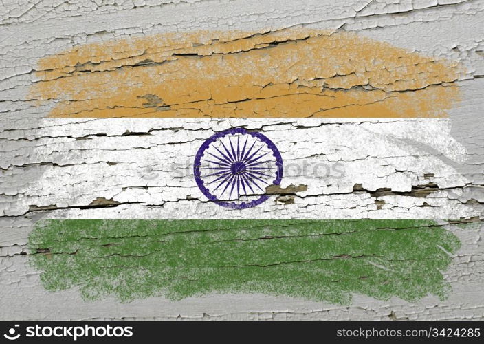 Chalky india flag precisely painted with color chalk on grunge wooden texture