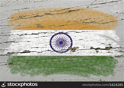 Chalky india flag precisely painted with color chalk on grunge wooden texture