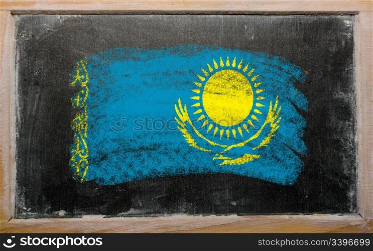 Chalky kazakstan flag painted with color chalk on old blackboard