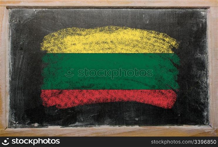 Chalky lithuanian flag painted with color chalk on old blackboard