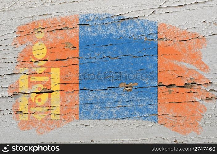 Chalky mongolia flag painted with color chalk on grunge wooden texture