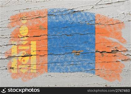 Chalky mongolia flag painted with color chalk on grunge wooden texture