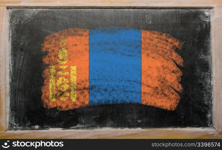 Chalky mongolian flag painted with color chalk on old blackboard