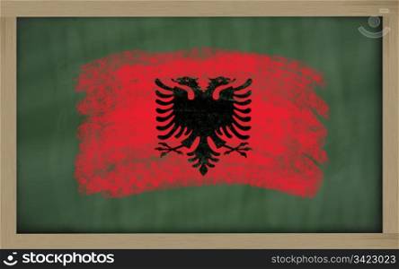 Chalky national flag of albania painted with color chalk on blackboard illustration