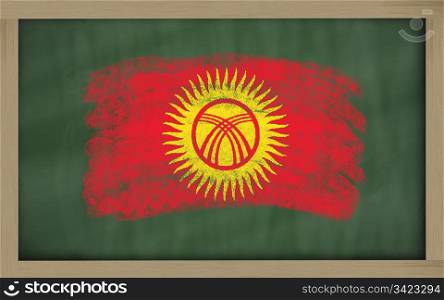 Chalky national flag of kirghizstan painted with color chalk on blackboard illustration