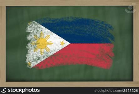 Chalky national flag of philippines painted with color chalk on blackboard illustration