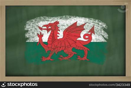 Chalky national flag of wales painted with color chalk on blackboard illustration