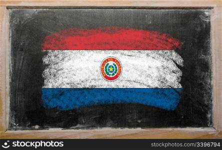 Chalky paraguay flag painted with color chalk on old blackboard