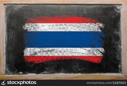 Chalky thailand flag painted with color chalk on old blackboard