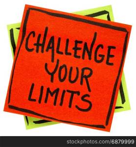 challenge your limits inspirational reminder note - handwriting in black ink on an isolated sticky note