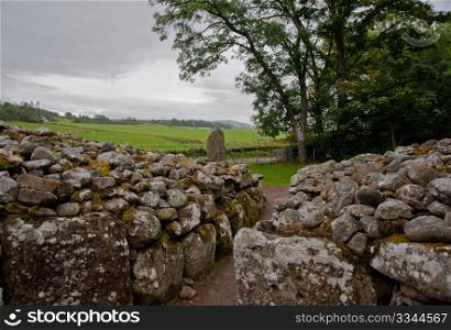 Chambered cairn and standing stone at Balnuran of Clava