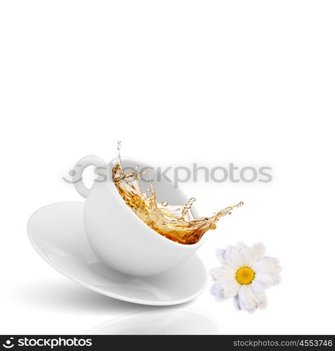 Chamomile tea. White cup of tea with chamomile flower