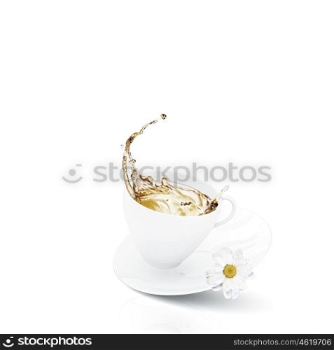 Chamomile tea. White cup of tea with chamomile flower
